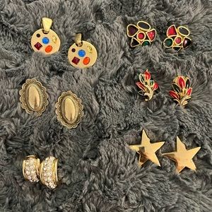 7 pair of clip on earrings.